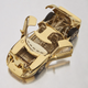 Image for article titled This Tiny 18-Karat Gold Ford GT Model Car Will Only Cost You About $40,000